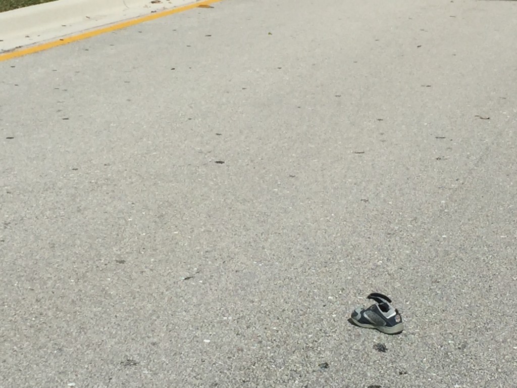 Toddler shoe in road